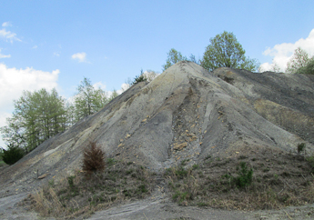 Abandoned mine lands include tall piles of leftover materials that can endanger public health and safety