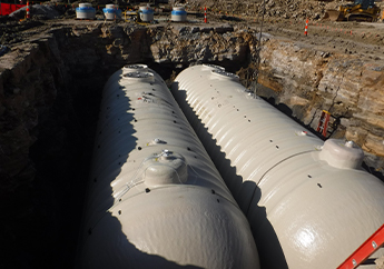 Two NI 320 underground storage tanks in the process of being installed
