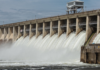 Water rushes through the floodgates at Bagnell Dam in Lake of the Ozarks. Bagnell Dam produces hydroelectric power.