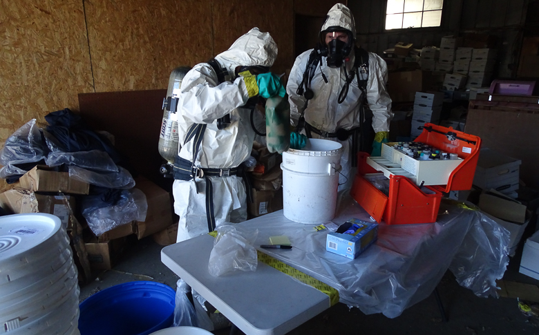 Environmental emergency response responded to an evidence storage area for a sheriff's office after hazardous materials were found to be reacting.