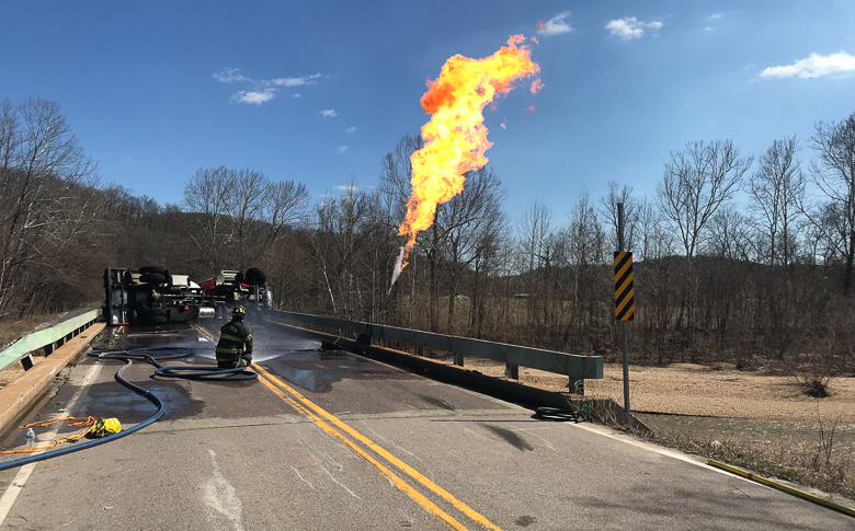 Environmental emergency response responded to an overturned propane tank on a bridge in Washington County.