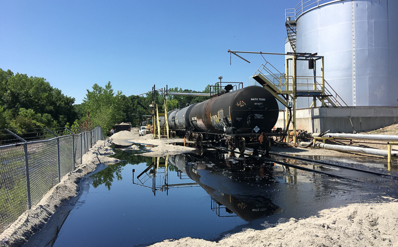 Environmental emergency response responded to release of coal tar from a locomotive after a valve malfunctioned.