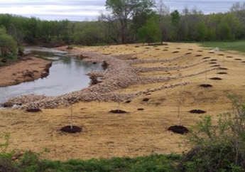 A use of stream management methods of re-sloping and longitudinal peaked stone toe protection