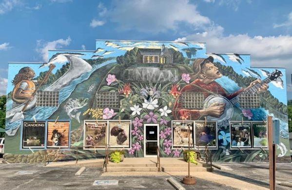 The Ozark Natural and Cultural Resource Center in Salem with new full-building mural completed by Columbia artist David Spear