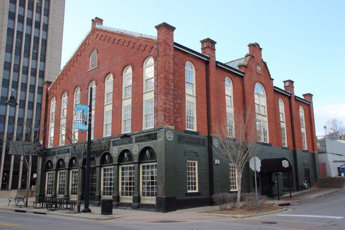Turner Hall is home of German social organizations and an opera house. Red brick window with Romanesque Revival style with German design influences. 