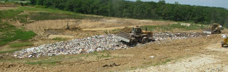 Heavy machinery moving solid waste at the Backridge Landfill
