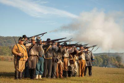 A group of soldiers reanacting Ewing’s Retreat at the Battle of Pilot Knob State Historic Site.