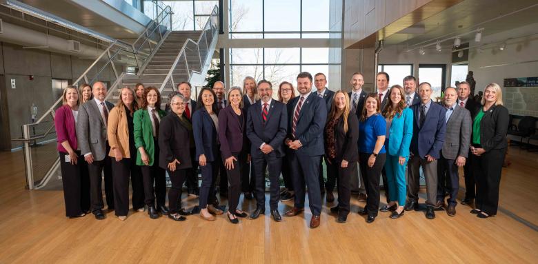 Director Schaefer (center) and the department's Executive Staff (director and deputies)
