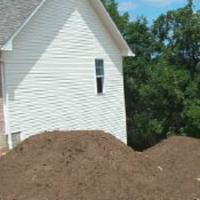 Stock piling top soil prevents compaction during construction.