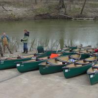 Preparing canoes for stream management workshop float.
