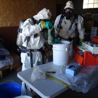 Environmental emergency response responded to an evidence storage area for a sheriff's office after hazardous materials were found to be reacting.