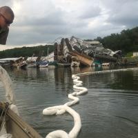 Environmental emergency response responded and deployed absorbent boom when a storm overturned boats at Pomme de Terre Lake.