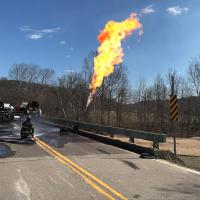 Environmental emergency response responded to an overturned propane tank on a bridge in Washington County.