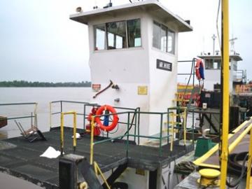 Diesel Emissions Reduction Act funding tugboat engine photo