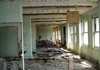 Inside an abandoned building that is undergoing a Brownfields Assessment