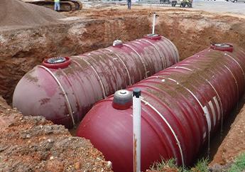 Two NI 356 underground storage tanks in the process of being installed