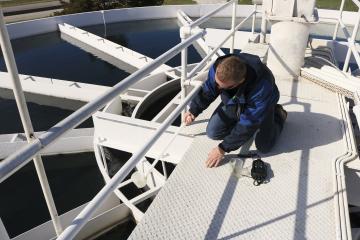 MoDNR staff member collects drinking water sample from a drinking water treatment plant