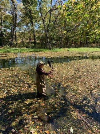 Geologist Lauren Mack of the Missouri Department of Natural Resources’ Water Resources Center conducting streamgaging operations in Newton County. 