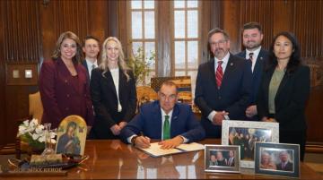 Gov. Mike Kehoe signs Executive Order 26-04 in his office at the Missouri State Capitol