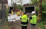 Environmental emergency response staff work with EPA on an incident involving over 400 abandoned containers in St. Louis.