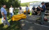 Environmental emergency response training with EPA on absorbent deployment and oil spill mitigation,